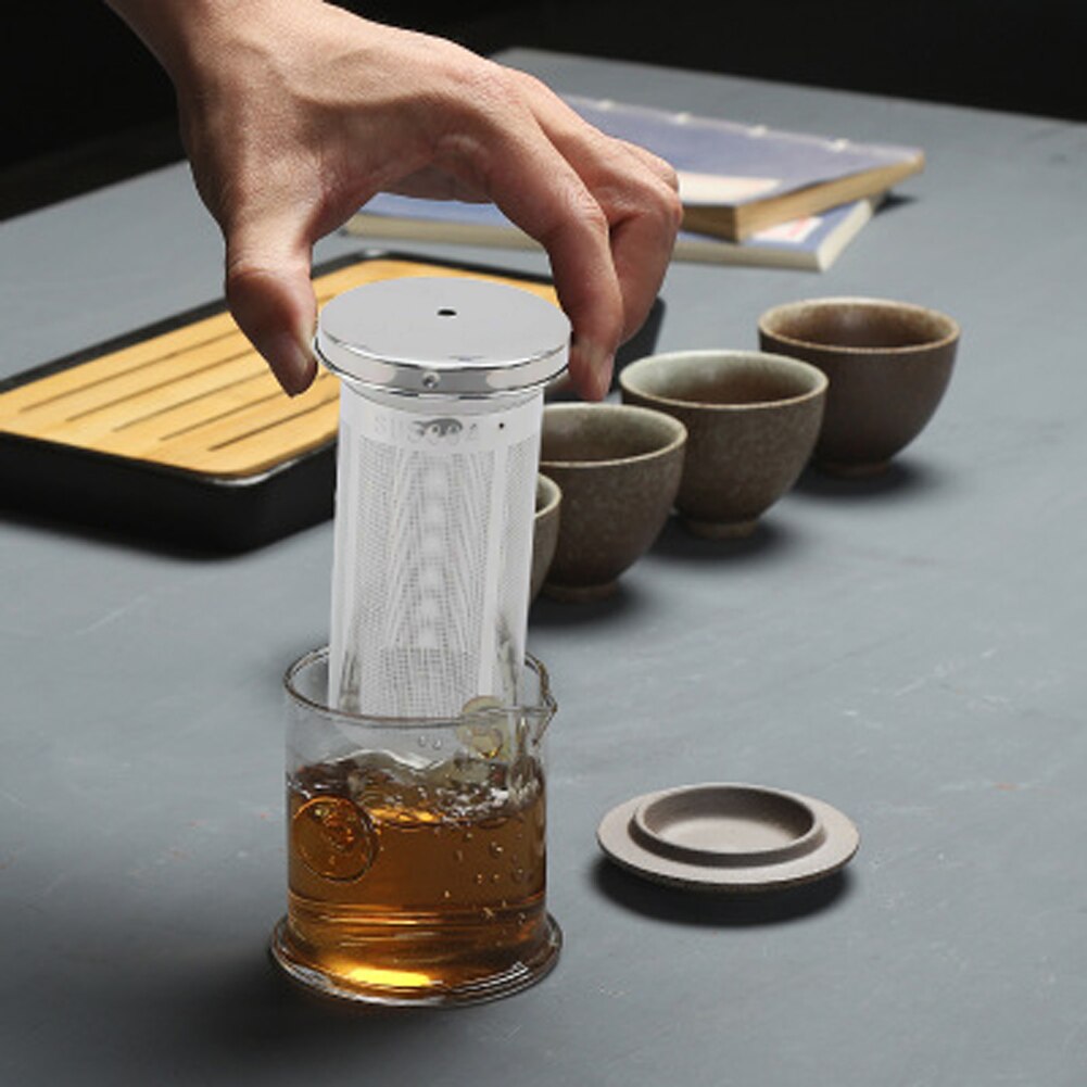 Passoire à thé à poignée poussoir - Infuseur à thé en acier inoxydable en  forme de boule poussoir – McEntee's Tea